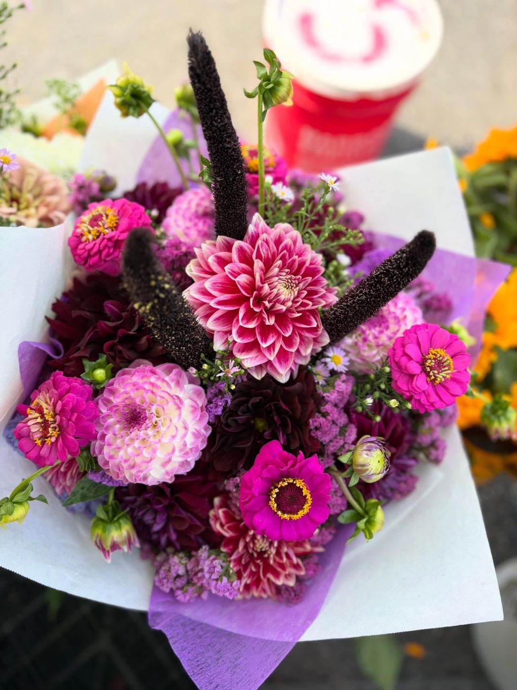 Pink and magenta dahlias in a colorful Thai D Garden bouquet