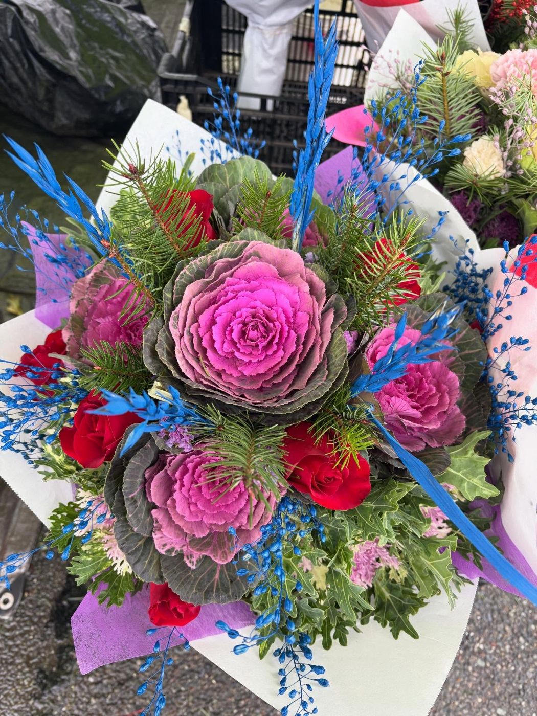 Bright pink, blue and green bouquet from Thai D Garden’s Instagram